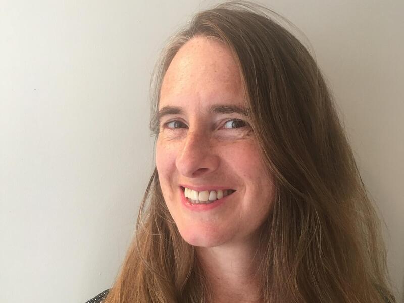 A portrait of a woman smiling 