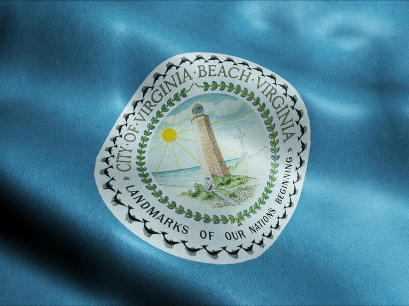 Close-up image of the Virginia Beach seal in the middle of the city's flag.