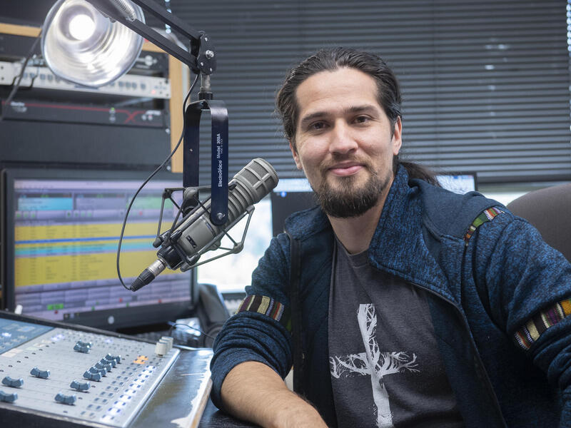 Oscar Contreras in the studio at Radio Poder 1380 AM