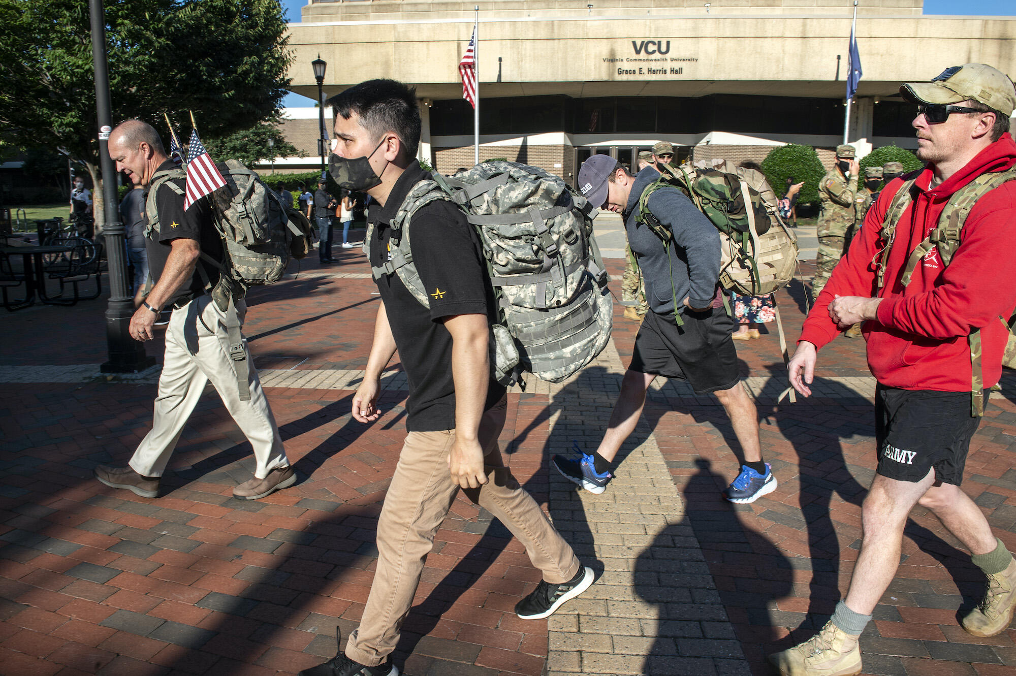 Event attendees honor those lost on 9/11/2001 and since in the War on Terror by “rucking” laps around the courtyard.