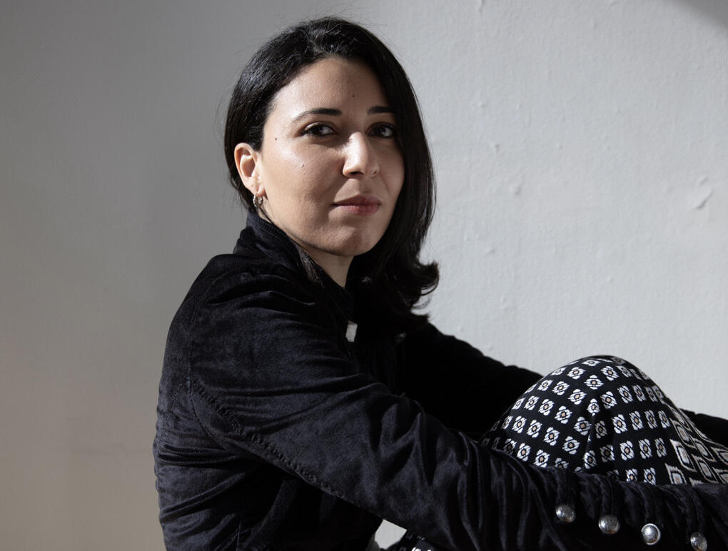 A photo of a woman sitting