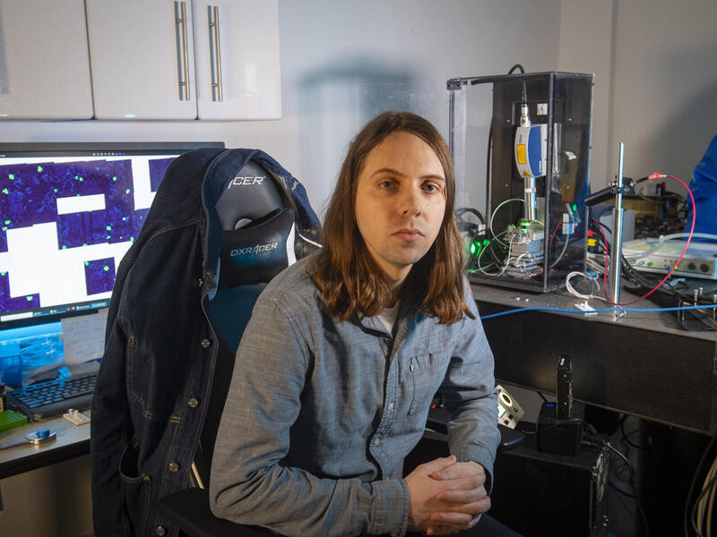 A photo of a man sitting in a computer chair. 