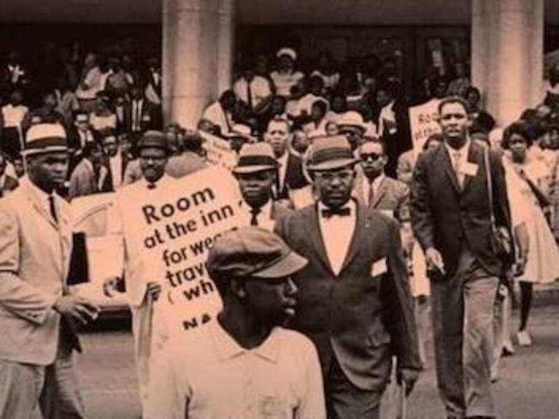 Author Ronnie Greene and the cover of Greene's book, \"Heart of Atlanta,\" the main photo of which shows Black Americans in the 1960s protesting in support of integration