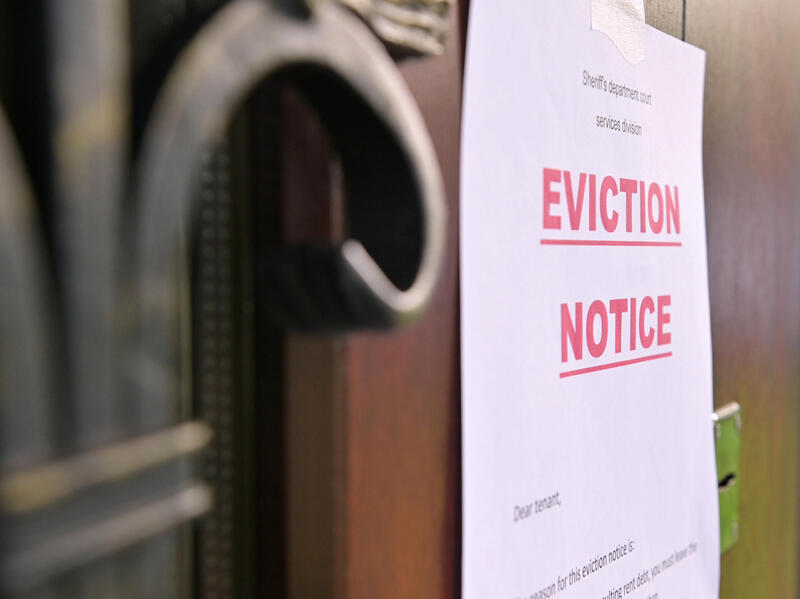 An eviction notice posted on a door 