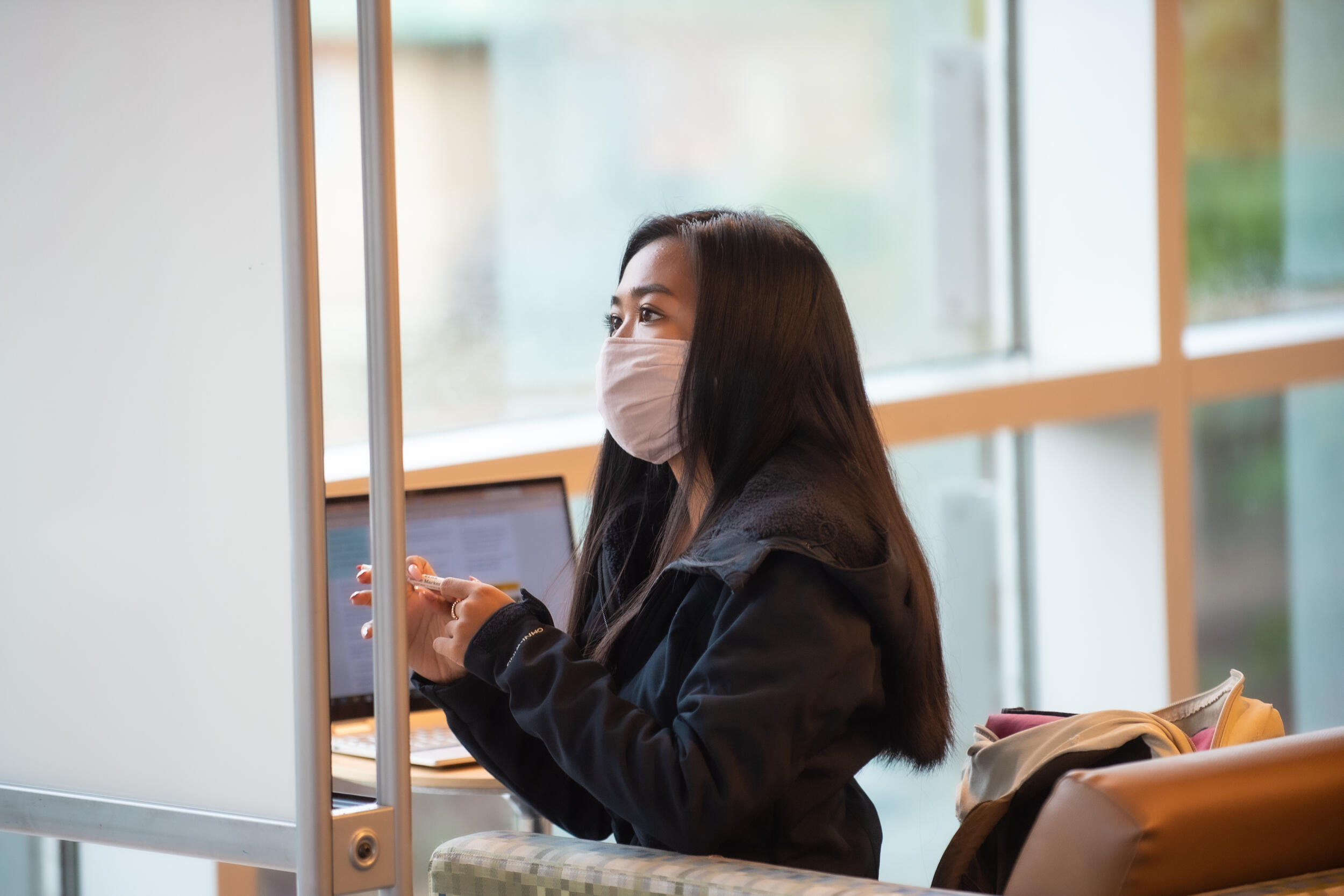 VCU student Anber Abab studying last fall inside James Branch Cabell Library. 