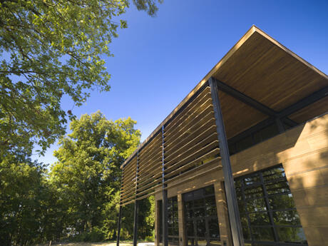 The conference room of the Walter L. Rice Education Building fills one end of the building, situated on the banks of the historic James River. Photo by Allen Jones, VCU Creative Services.