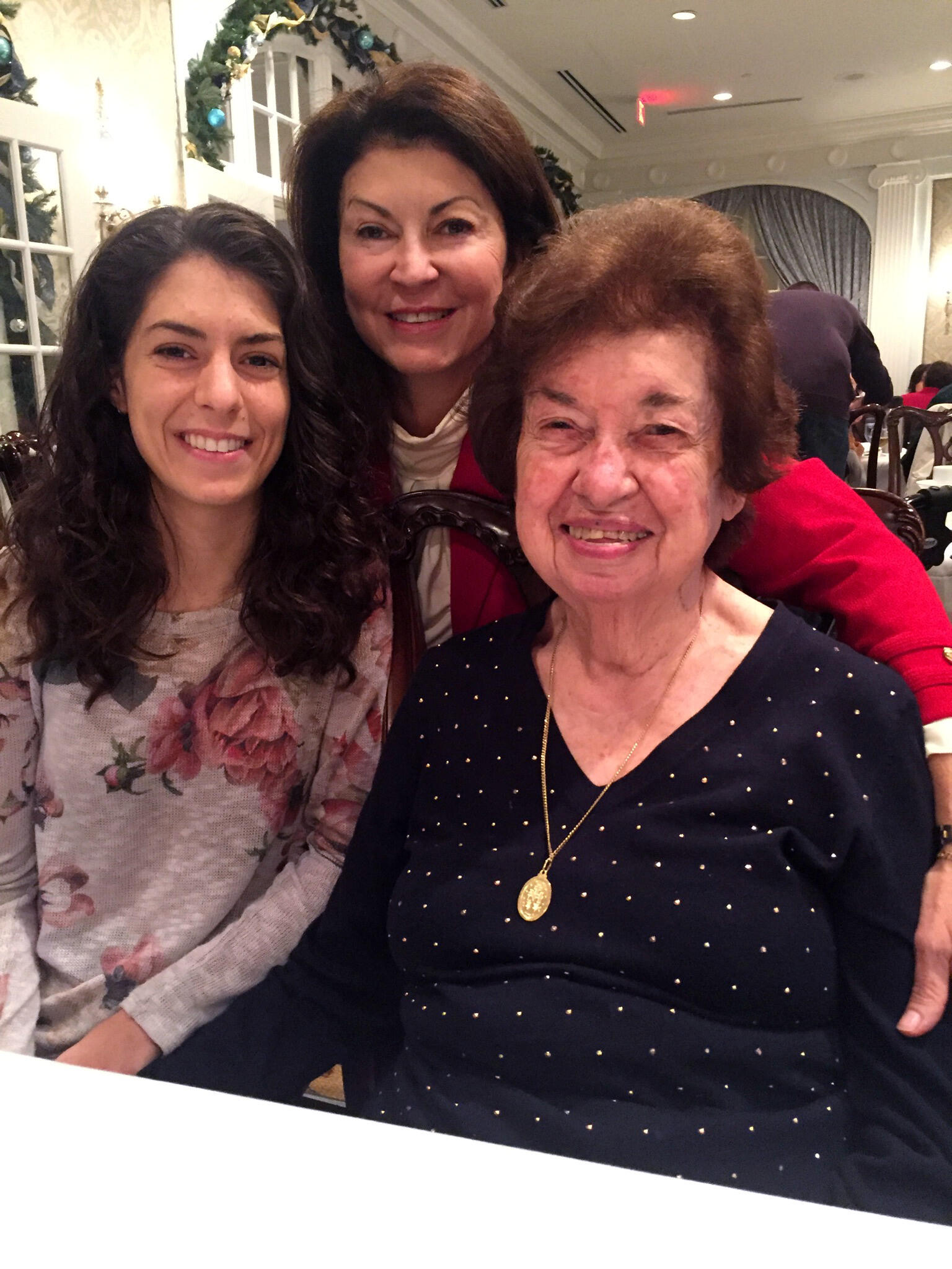 Cristina, with her grandmother, Florencia Perez, M.D., and mother, Lourdes Page, M.D.