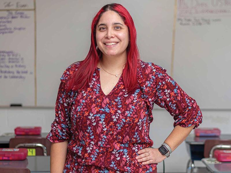 Image of Jessica Diaz, smiling in a classroom.