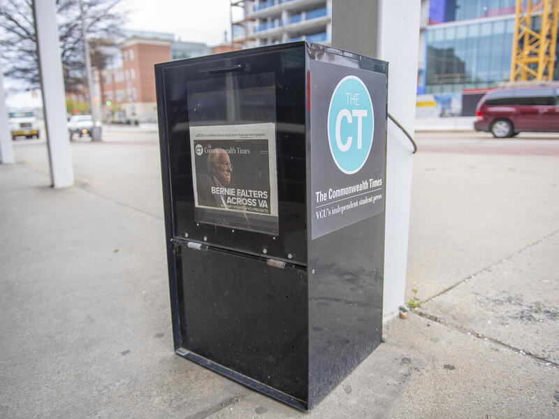 A newspaper distribution box of The Commonwealth Times.