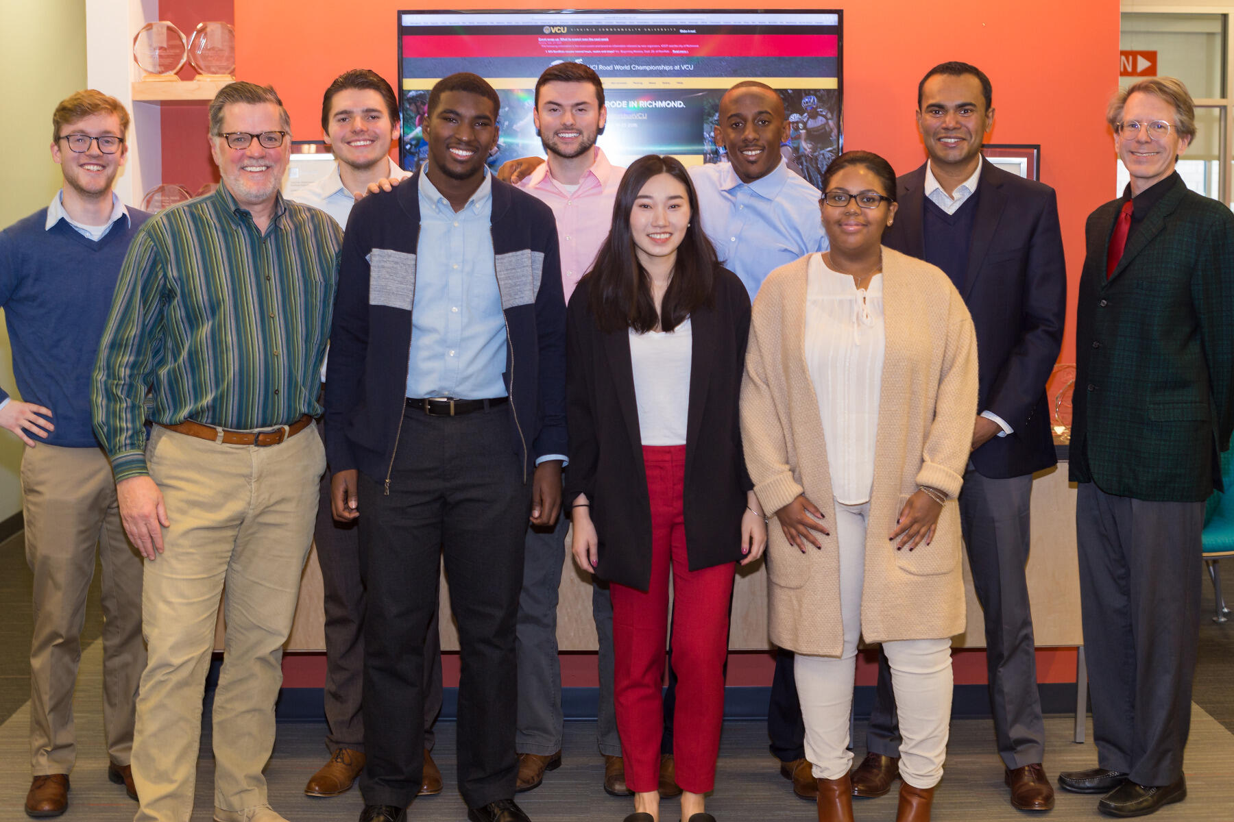 Kent Chapman, left; Tom Klug, associate vice president of University Marketing; Daniel Slider; Isaiah Harvin; Mark Simpson; Dorothy Yan; John Buckner; Daija Johnson; Mayoor Mohan, Ph.D., assistant professor of marketing; and Bruce Huhmann, Ph.D., professor and chair of the Department of Marketing.