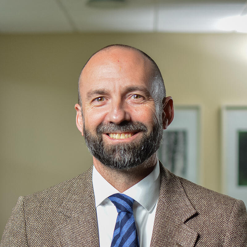 A photo of a man from the chest up