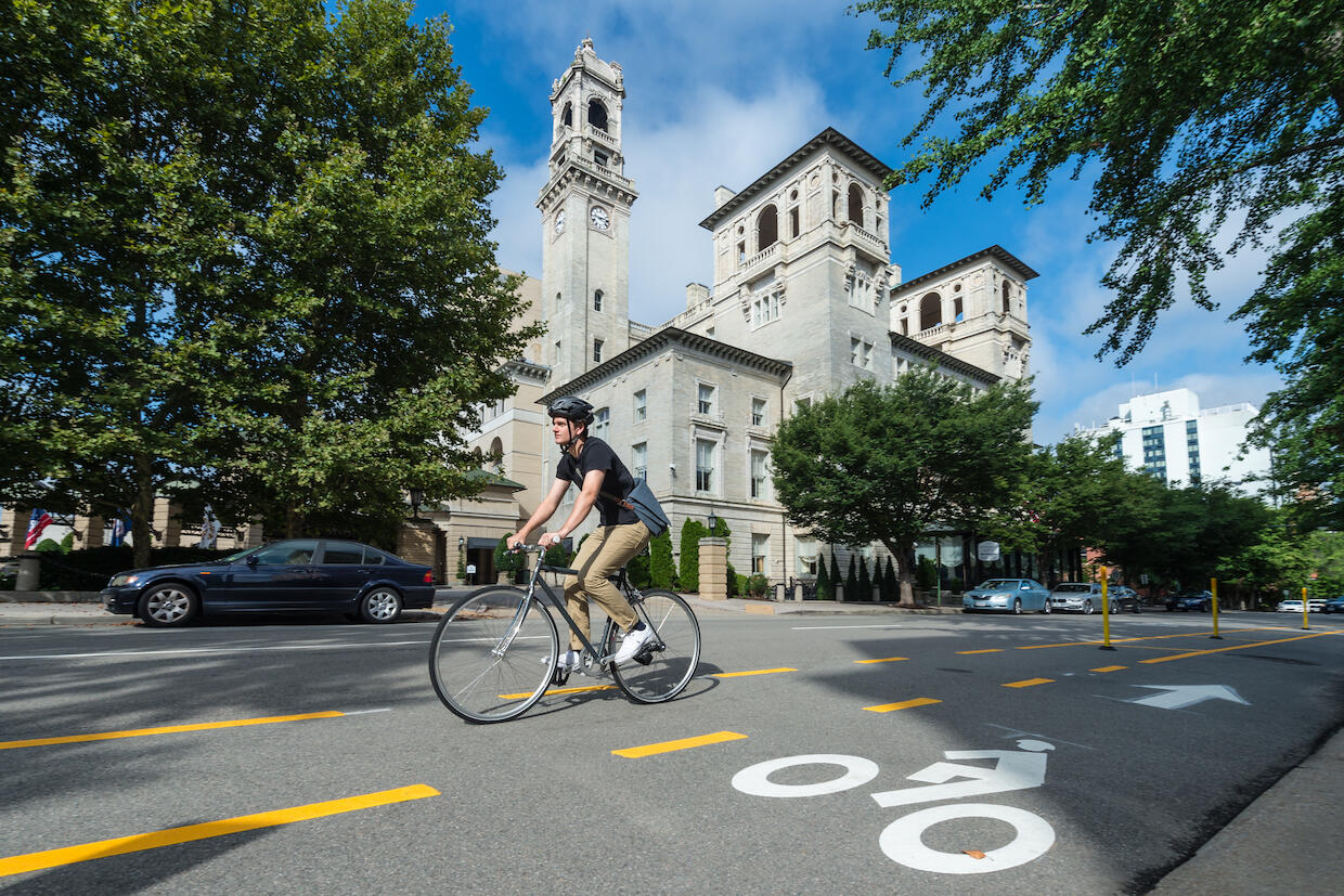 A bicyclist travels on a Richmond street bike lane.