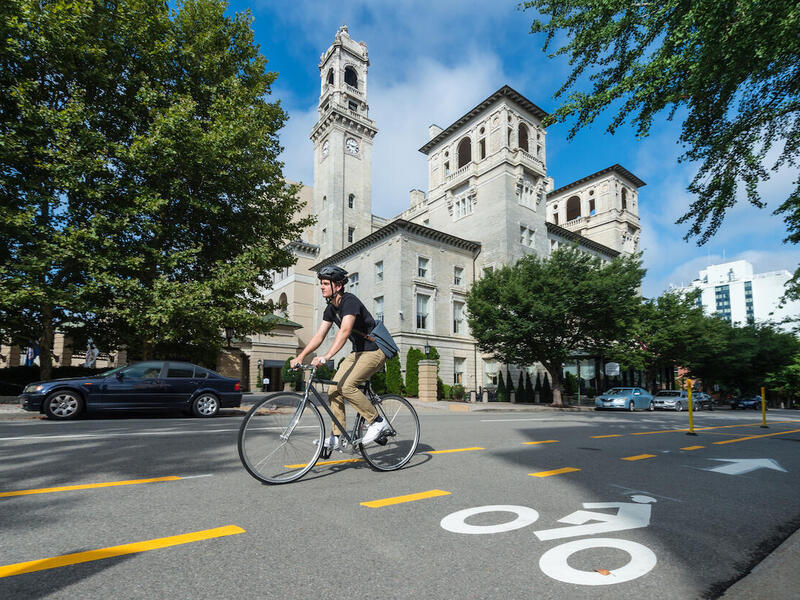 A bicyclist travels on a Richmond street bike lane.