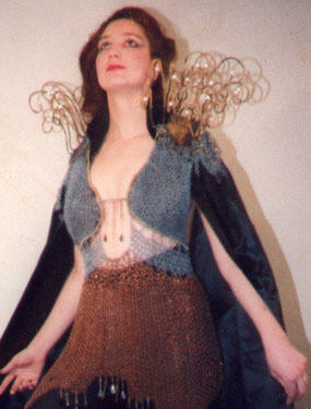 Heidi Hooper wearing a suit of fantasy armor she created.
