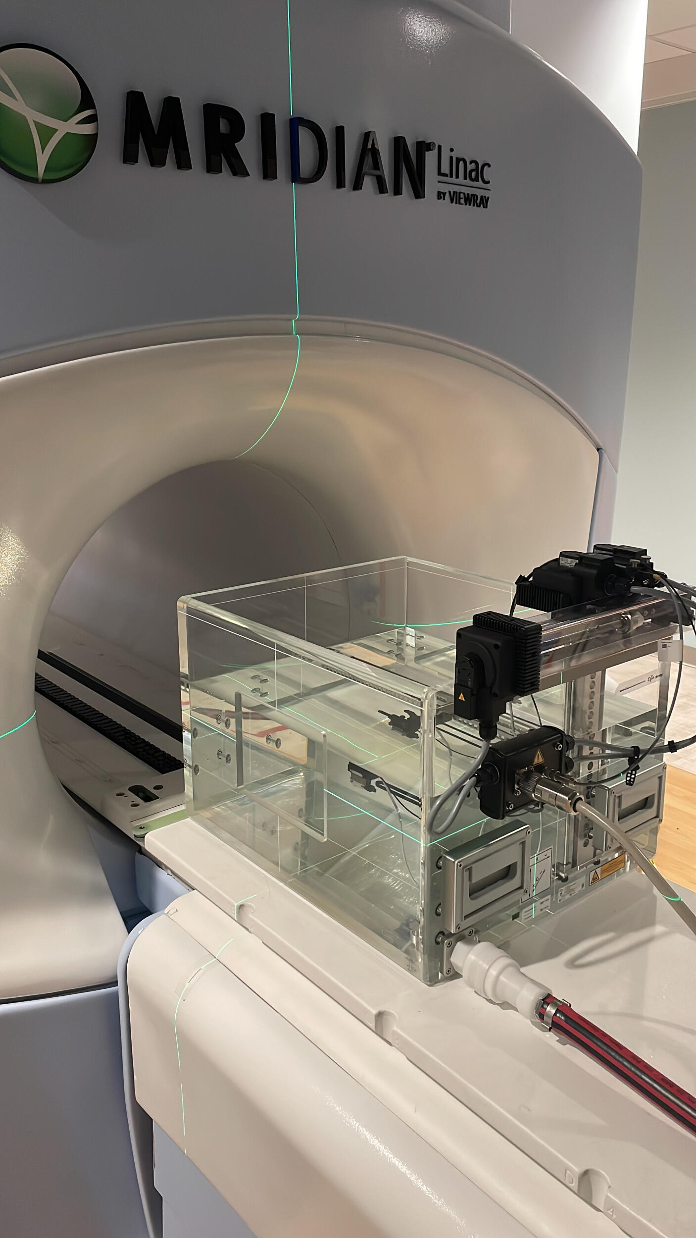 A portable water tank under a LINAC.