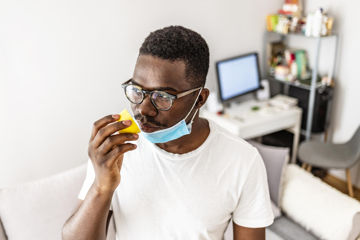 A patient uses an inhaler.