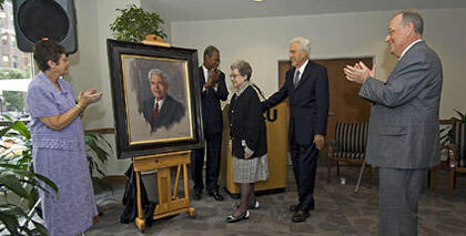 Esther C. Brandt (center) and Warren W. Brandt admire the newly unveiled portrait of Brandt, VCU’s first president, which will hang on the east wall of the Community Room, located on the first floor of Brandt Hall. Lois E. Trani (left), Henry G. Rhone, VCU vice provost for student affairs and enrollment services, and VCU President Eugene P. Trani lead the applause. 

Photo by Allen Jones, VCU Creative Services
