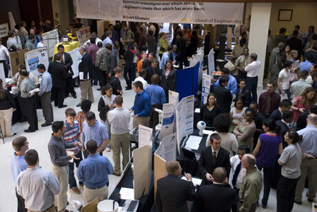 It was standing room only at the VCU School of Engineering atrium on Friday, April 24, for the annual Senior Design Expo. The expo is the culmination of eight months of effort by the design teams. Nearly 40 teams participated, and projects ranged from an automated security system to a portable solar desalination unit and a thermoelectric generator. Photo by Melissa Gordon, VCU Communications and Public Relations.