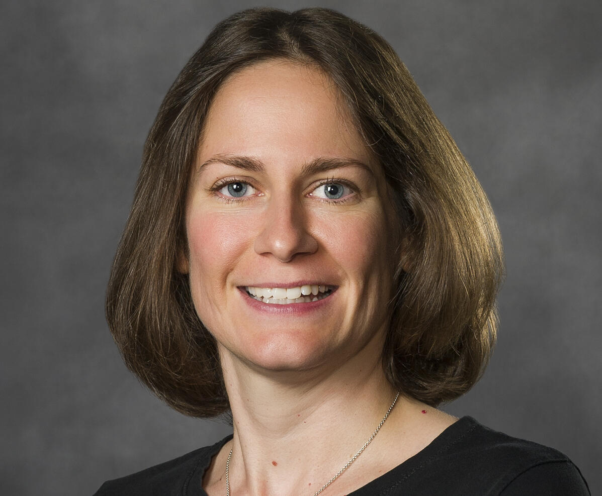 A photo of a woman from the shoulders up