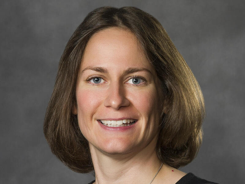 A photo of a woman from the shoulders up