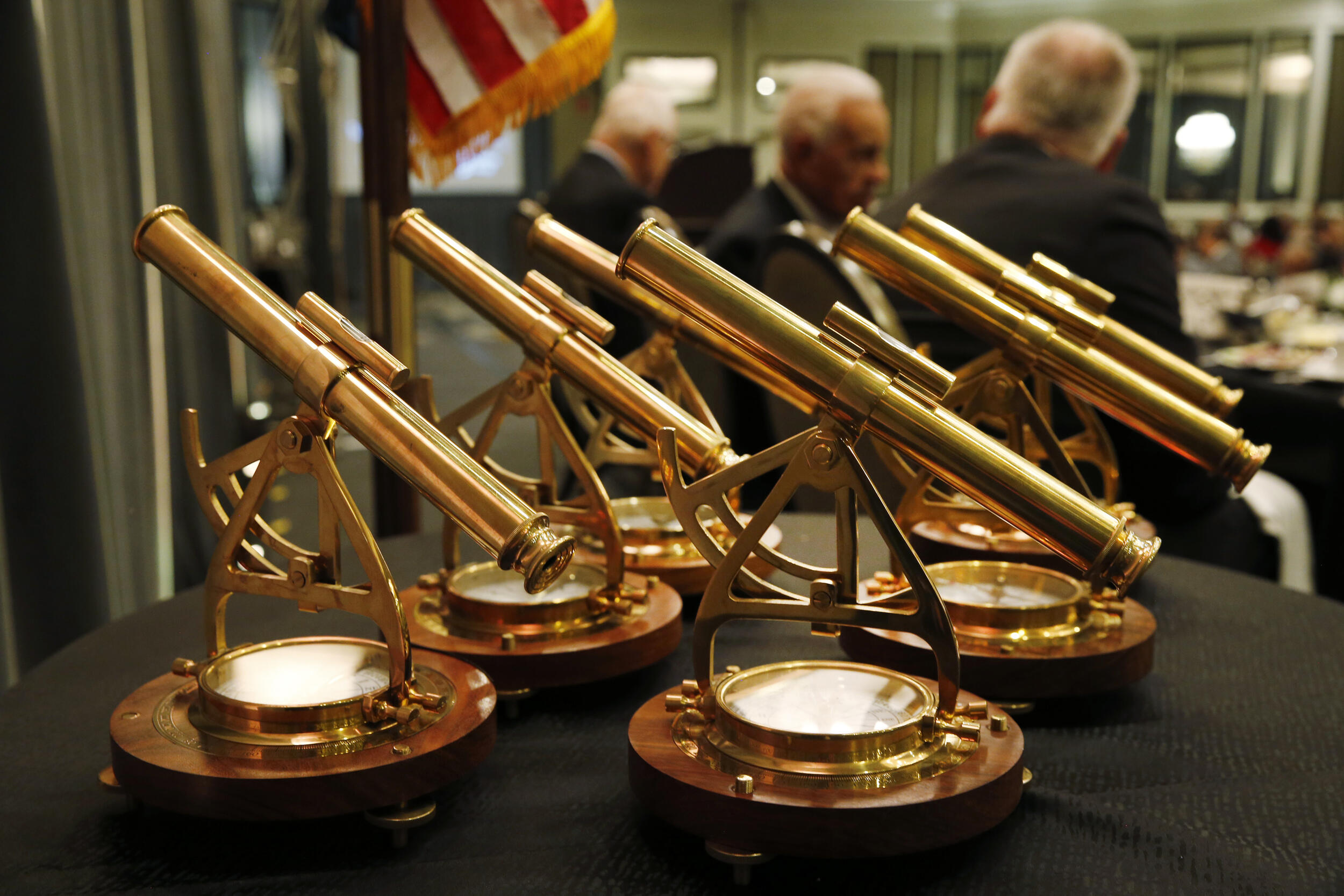 A photo of six awards sitting on a table. 
