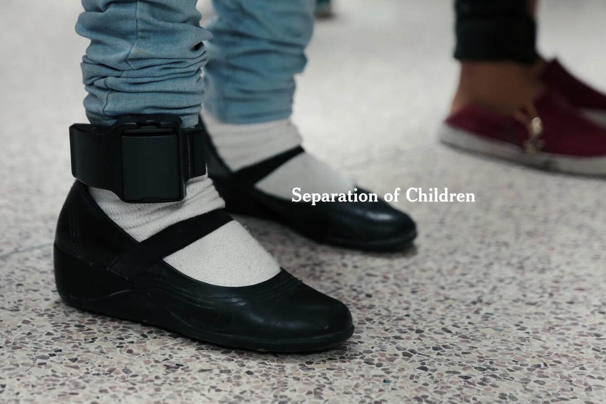 Two pairs of feet shown, one pair shows an electronic monitoring bracelet around its right foot. The words \"separation of children\" are displayed overtop.