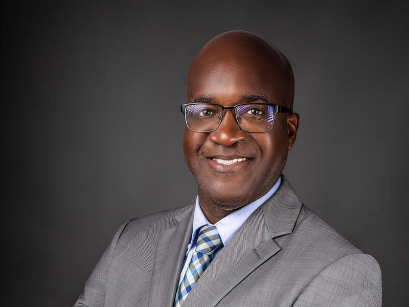 A photo of a man from the shoulders up