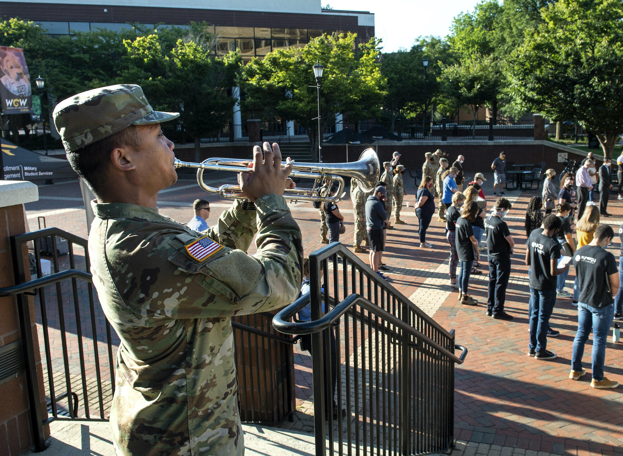 a VCU military student plays trumpet at a 9/11 anniversary event.