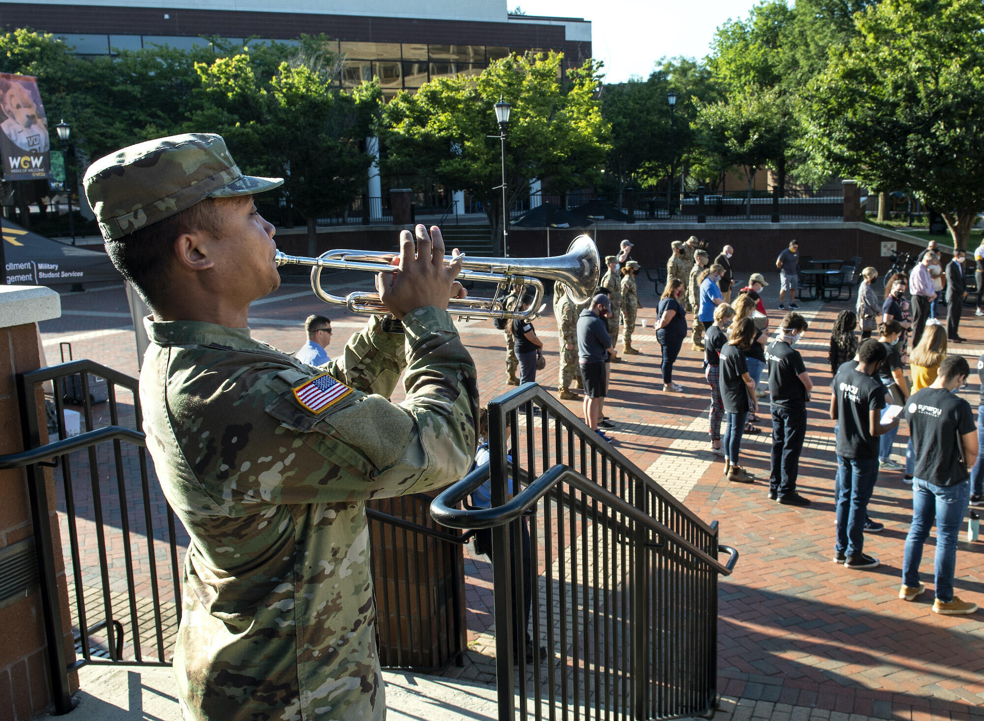 a VCU military student plays trumpet at a 9/11 anniversary event.
