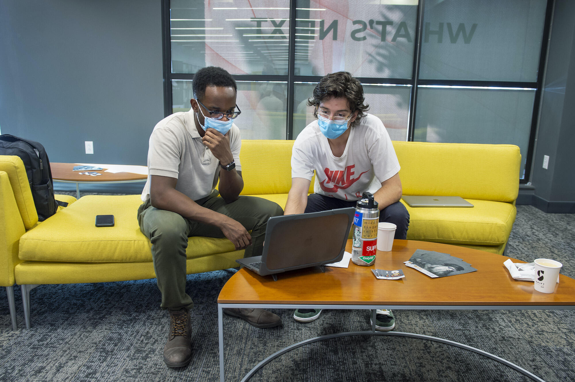 Left: Students Alfred Price, and Ethan Parker discuss ideas in the new Shift Retail Lab
