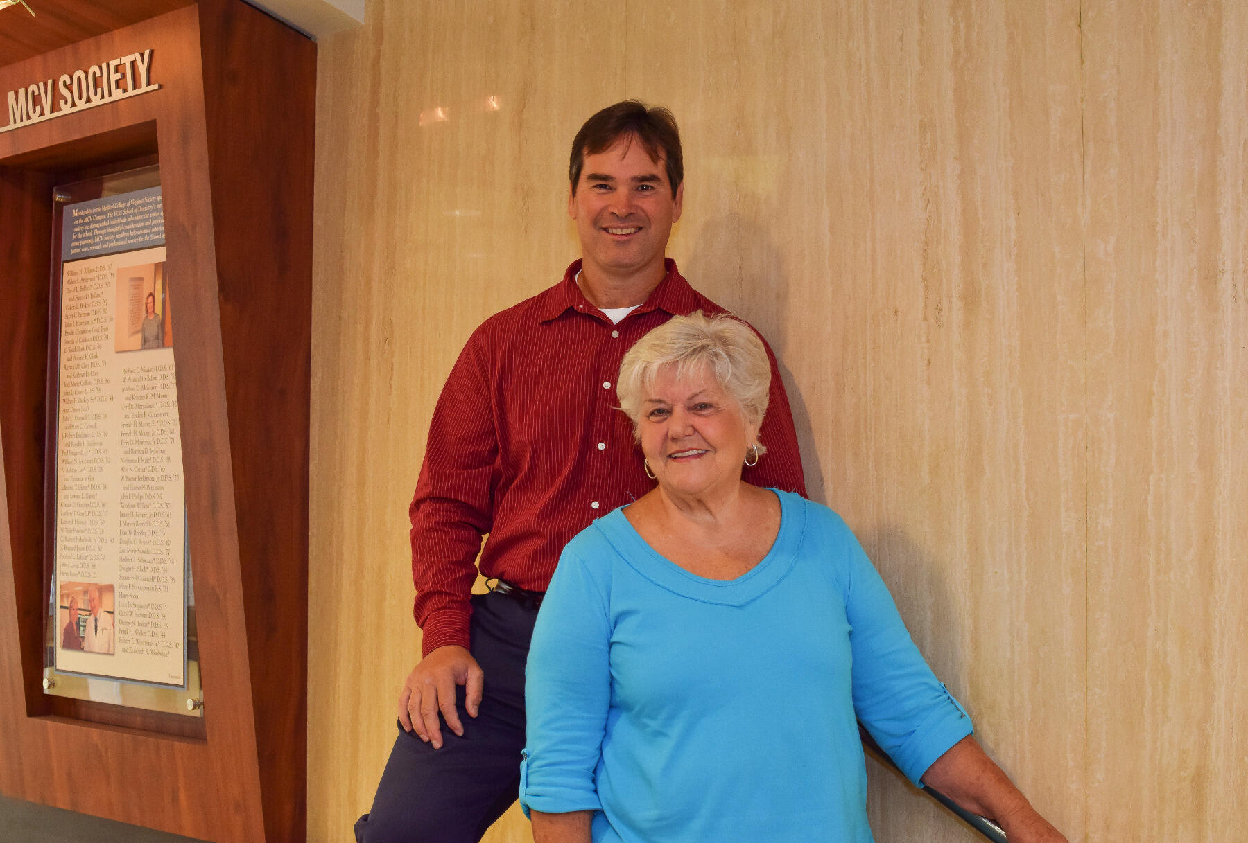 Hazel Luton, who has served in various roles in the School of Dentistry for more than 40 years, with Mark Beltrami, D.D.S., an alumnus who started a scholarship fund in Luton's name.