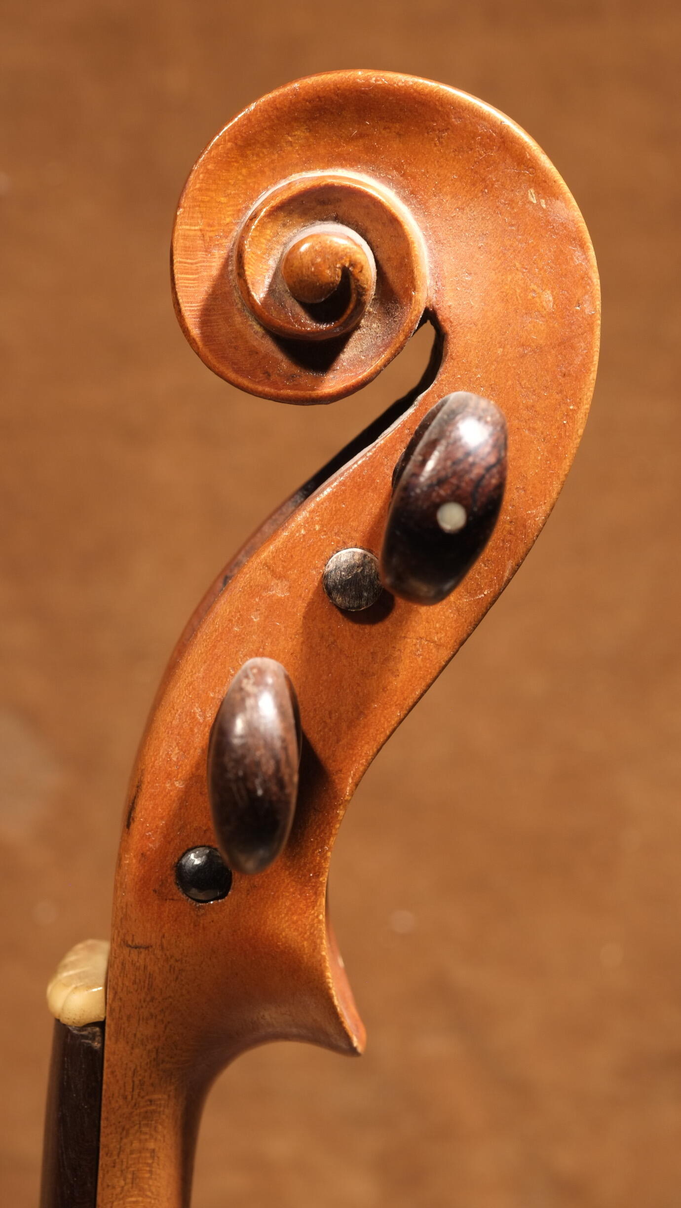 Close up of the scroll on one of the Violins of Hope that has been restored by Amnon Weinstein.