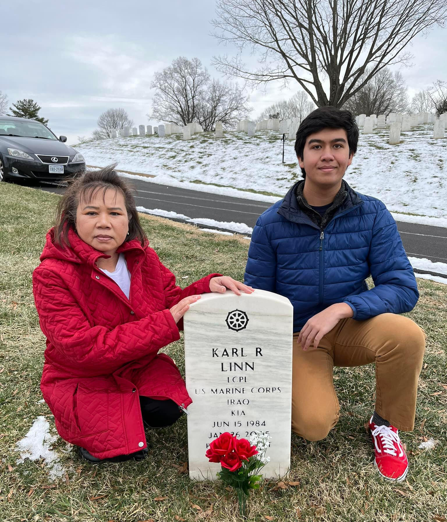 Malisa Linn and VCU junior Roman Cutler visit the grave of Karl Linn in Culpeper National Cemetery.