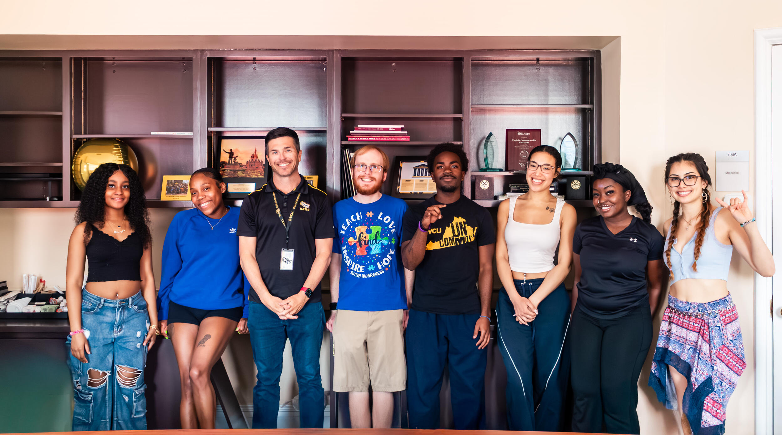 A group photo of seven people. 