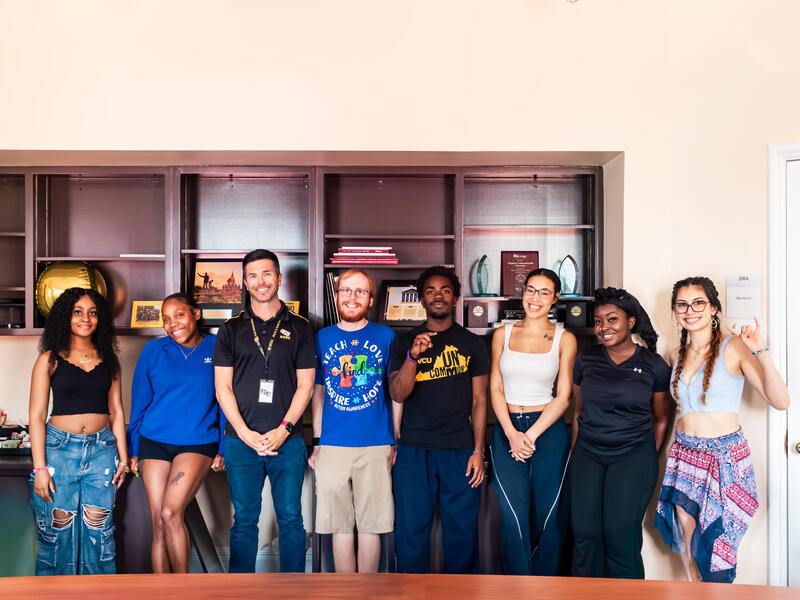 A group photo of seven people. 
