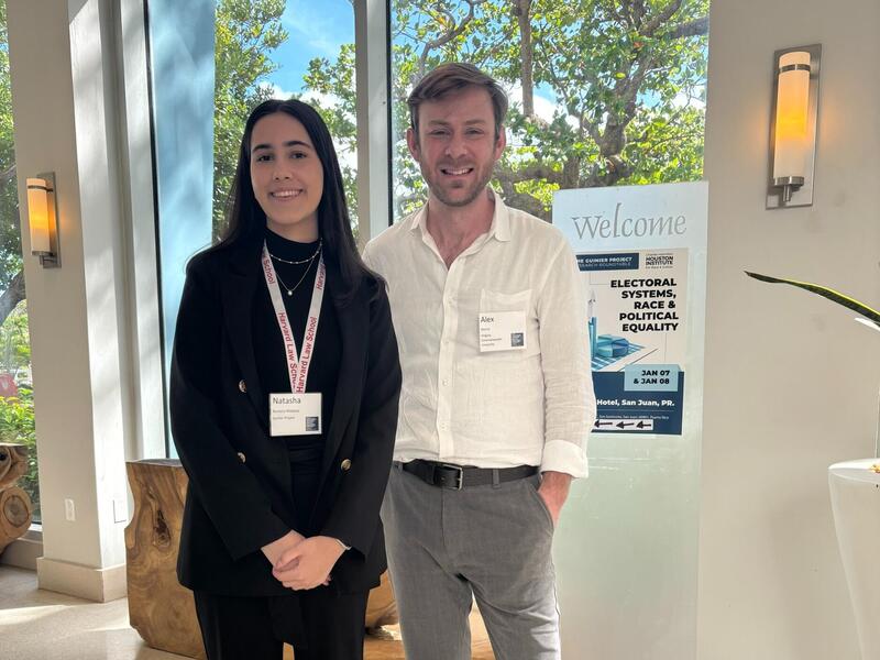 A photo of a man and woman standing next to each other. 
