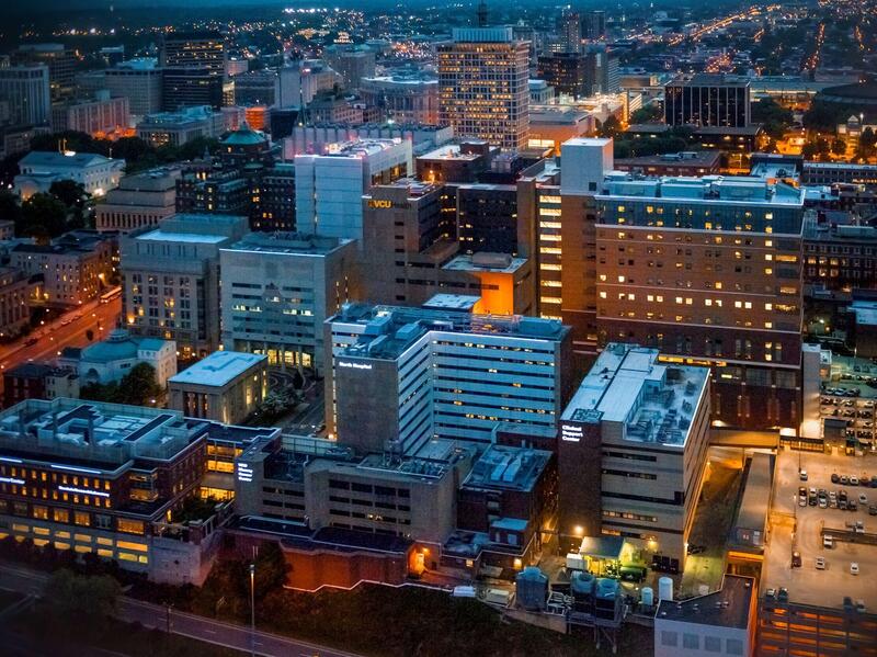An aerial photo of VCU's downtown medical campus in Richmond, Virginia at night.