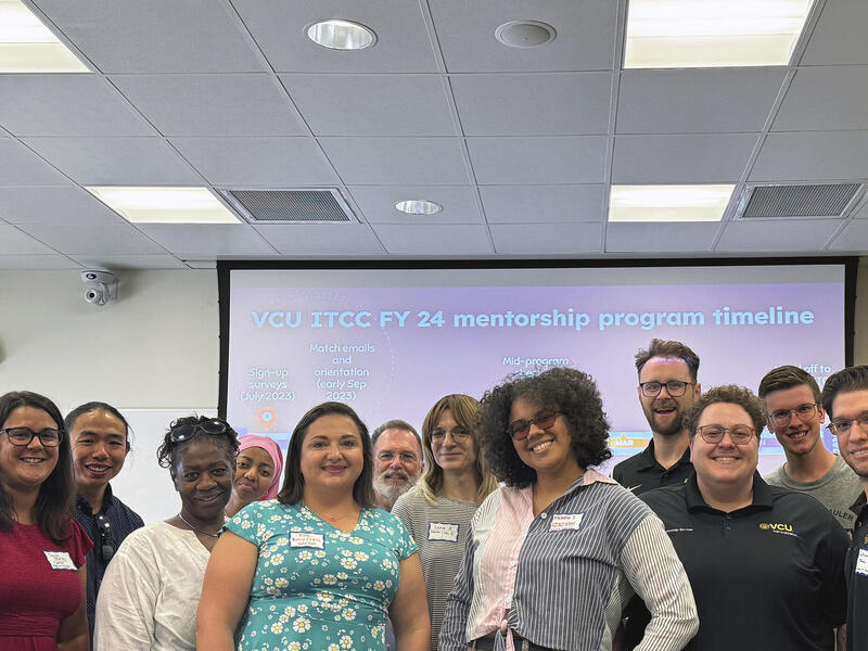 A group photo of 12 people. 