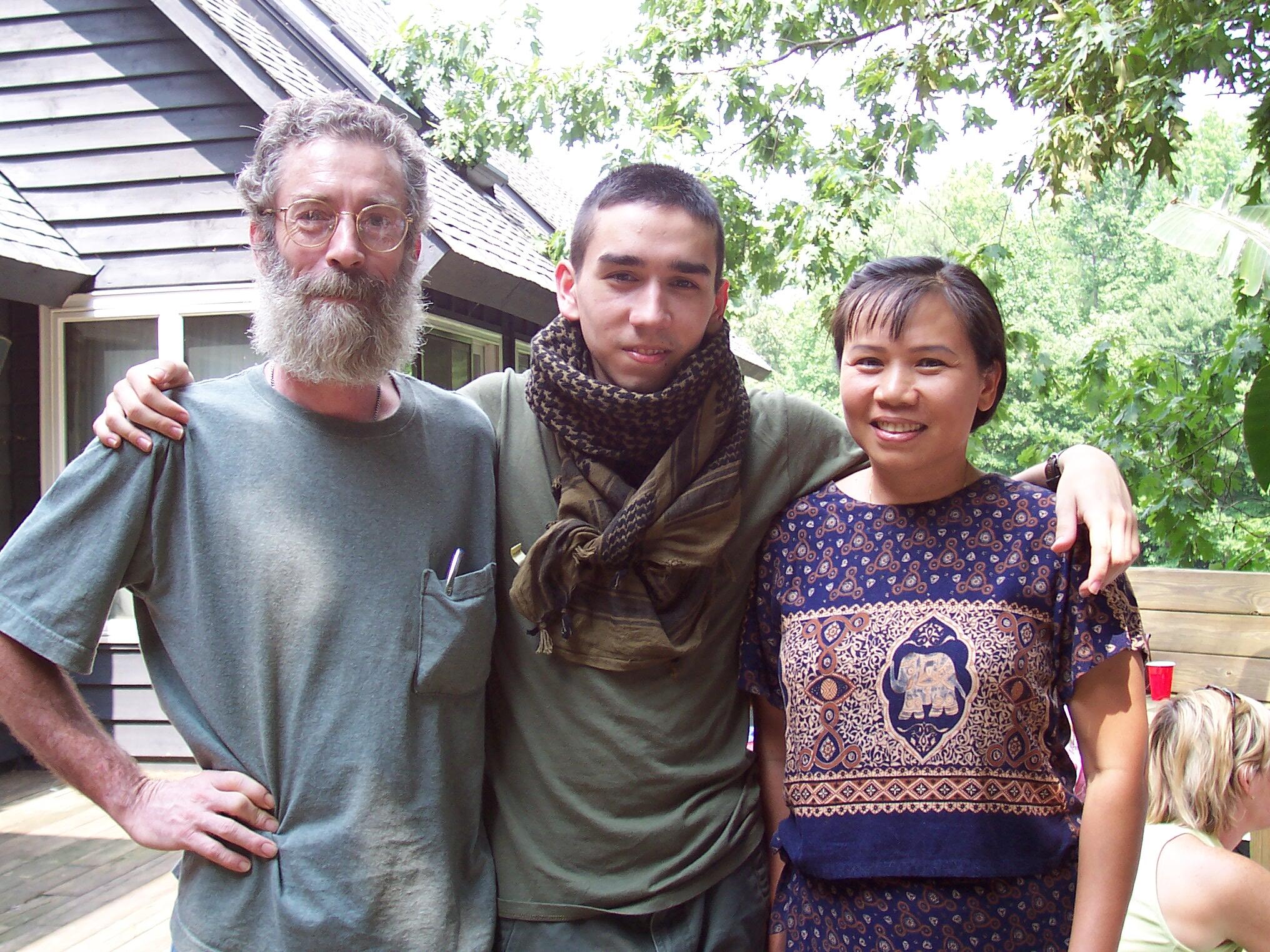 Karl Linn (middle) shares a happy moment with his father Dick Linn and mother Malisa.