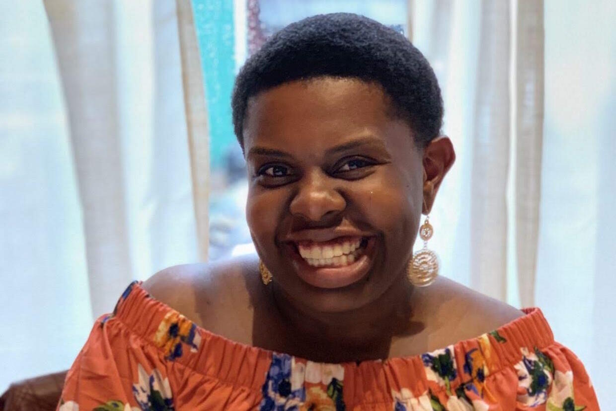 A portrait of a smiling Alisha Robinson.