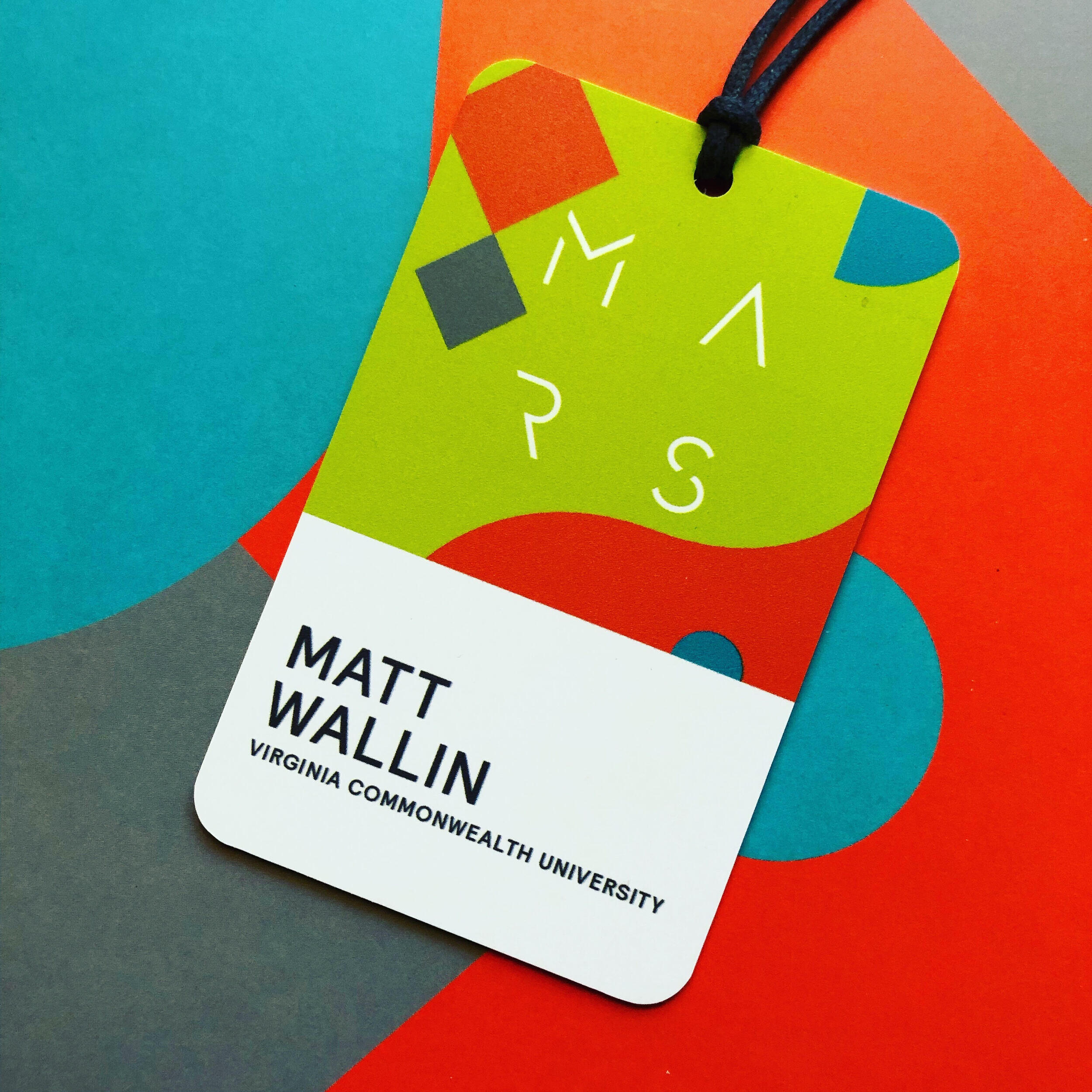 A multi-colored guest pass for the MARS conference with Matt Wallin, Virginia Commonwealth University listed.