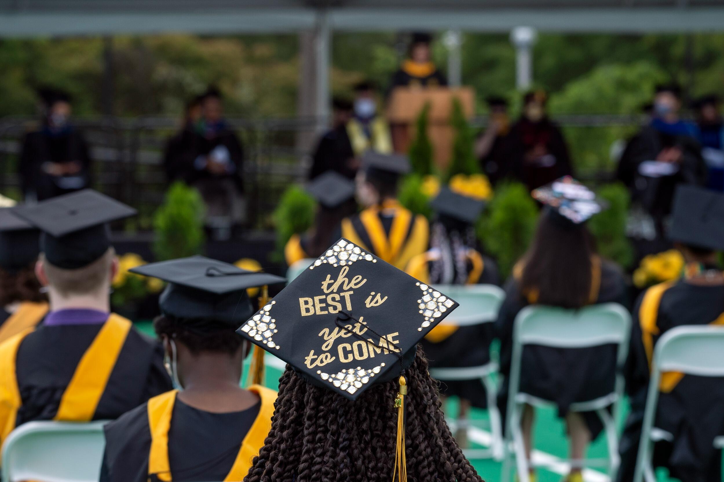 Graduation cap decorated with the words the best is yet to come.