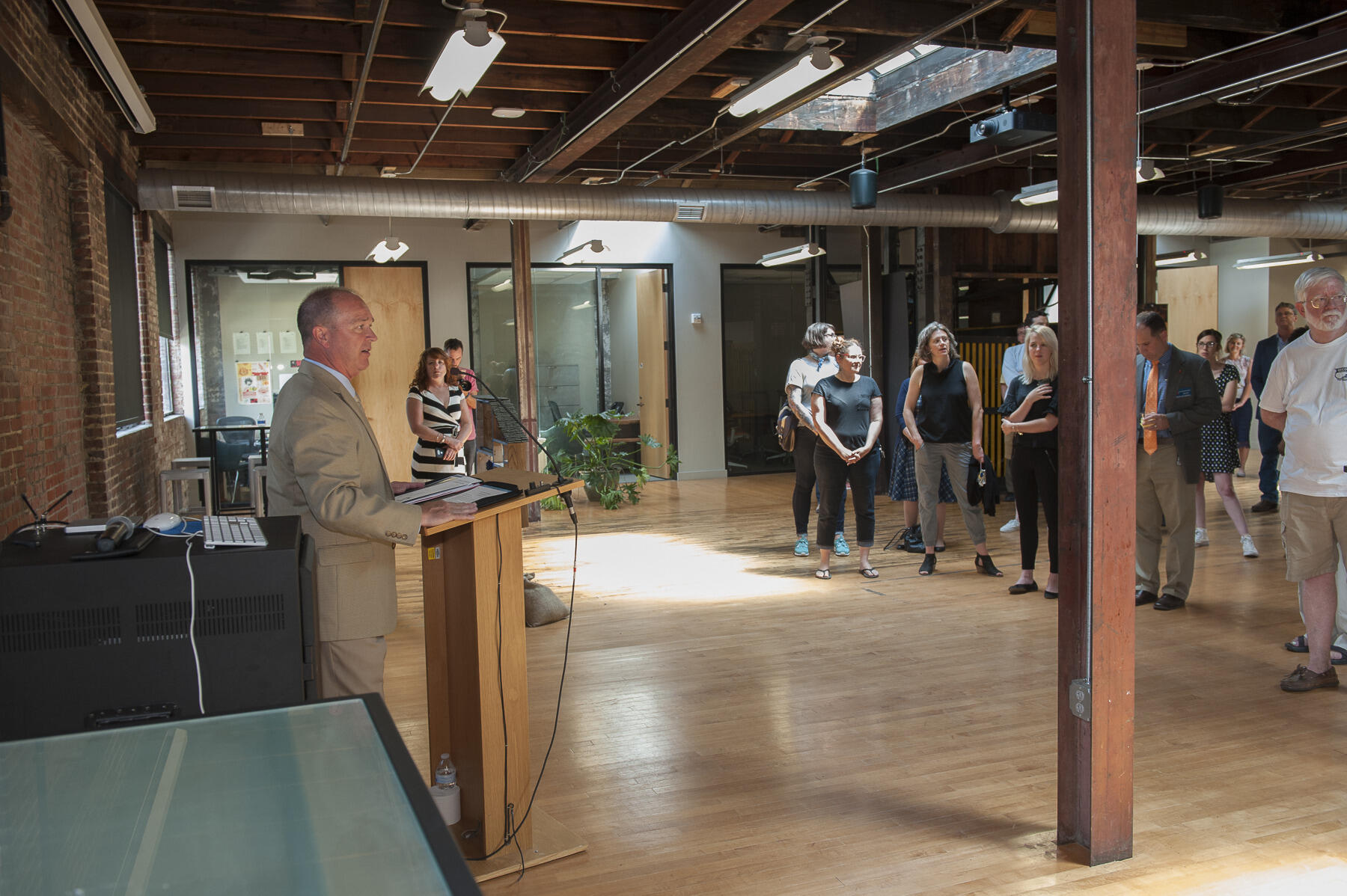 Stephen Ross, director of Military Student Services and an Air Force veteran, speaks to the crowd at The Depot.