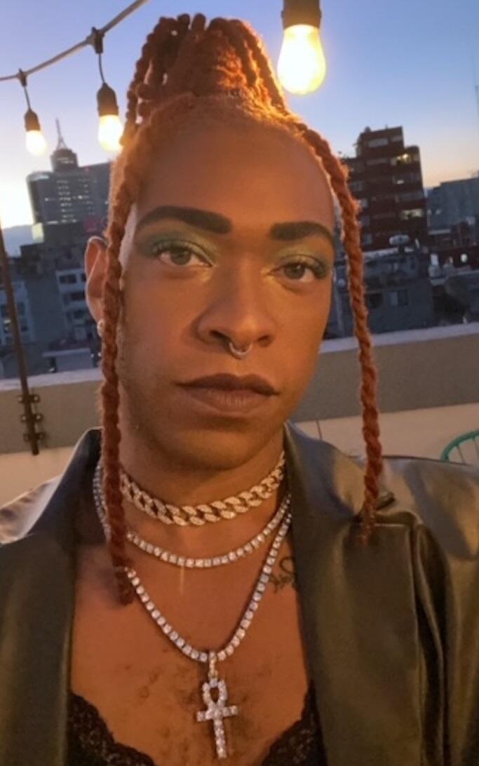 A photo of a person from the shoulders up. 