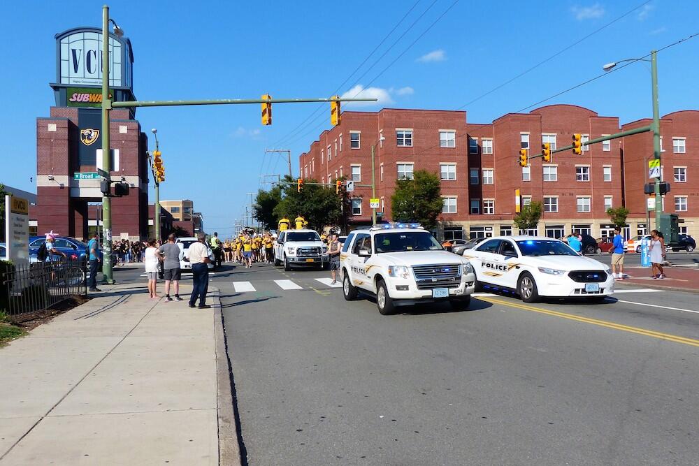 VCU Police lead students down Harrison Street during the university's annual Spirit Walk last August. (File photo)