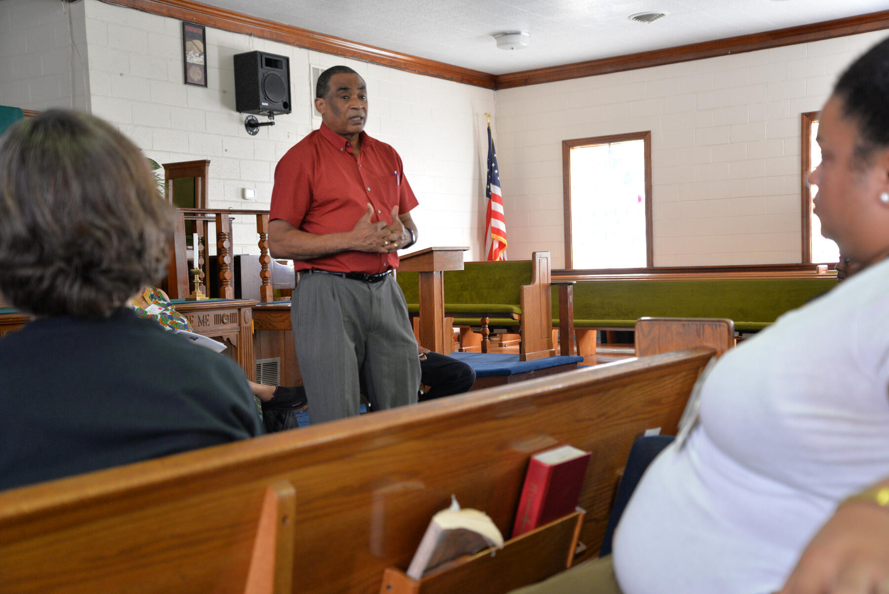 Rev. Sylvester L. (Tee) Turner of Pilgrim Baptist Church in the East End talks to VCU social work students about the neighborhood's history and how that history is influencing the challenges facing the community today.