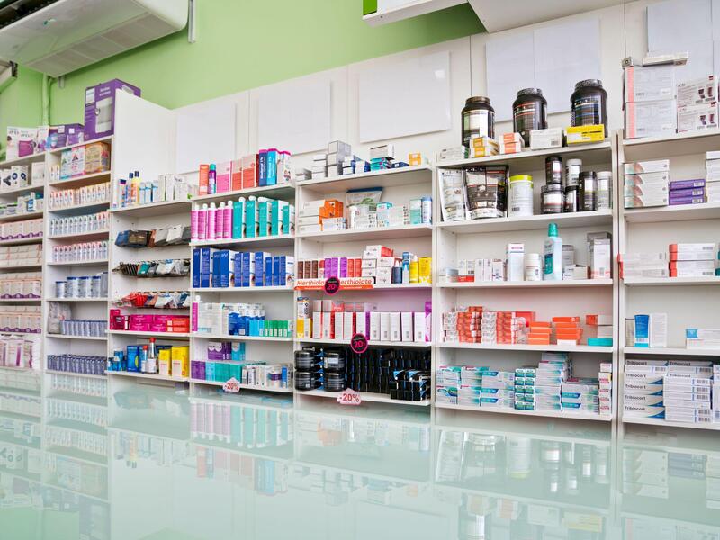 Shelves of medications in a pharmacy.