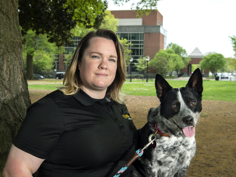 Ashley Lawrence and her dog, Roxie, in Monroe Park.