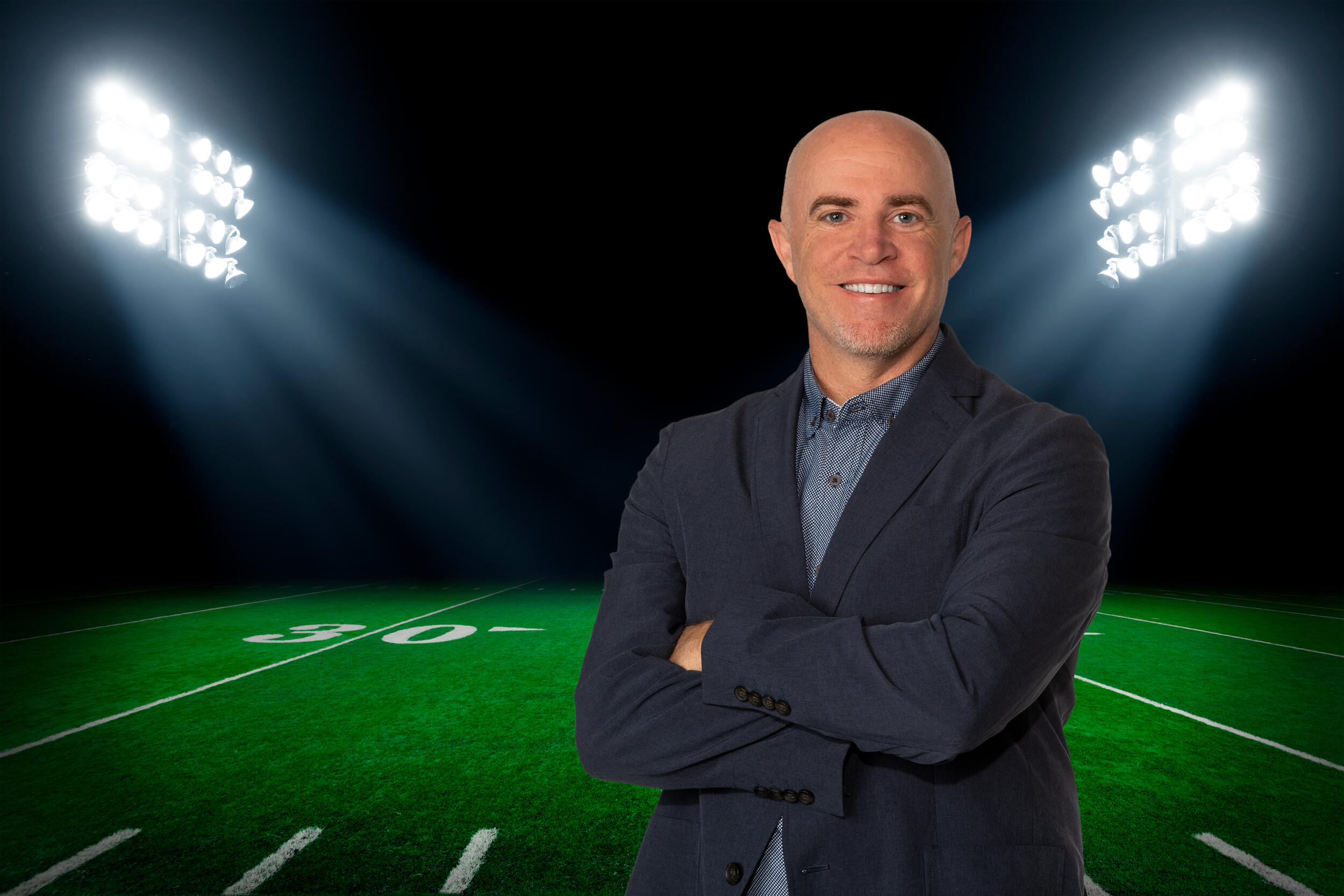 A photo of a man from the waist up. 