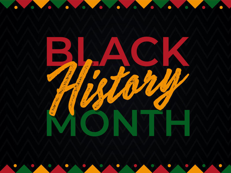 Black History Month in red, yellow, and green text on a black background and a red, yellow, and green geometric patterned border. 